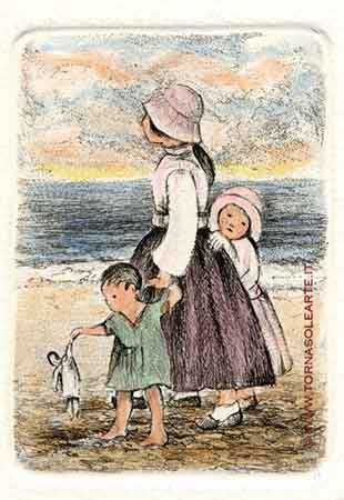 Bambina con fratellini al mare